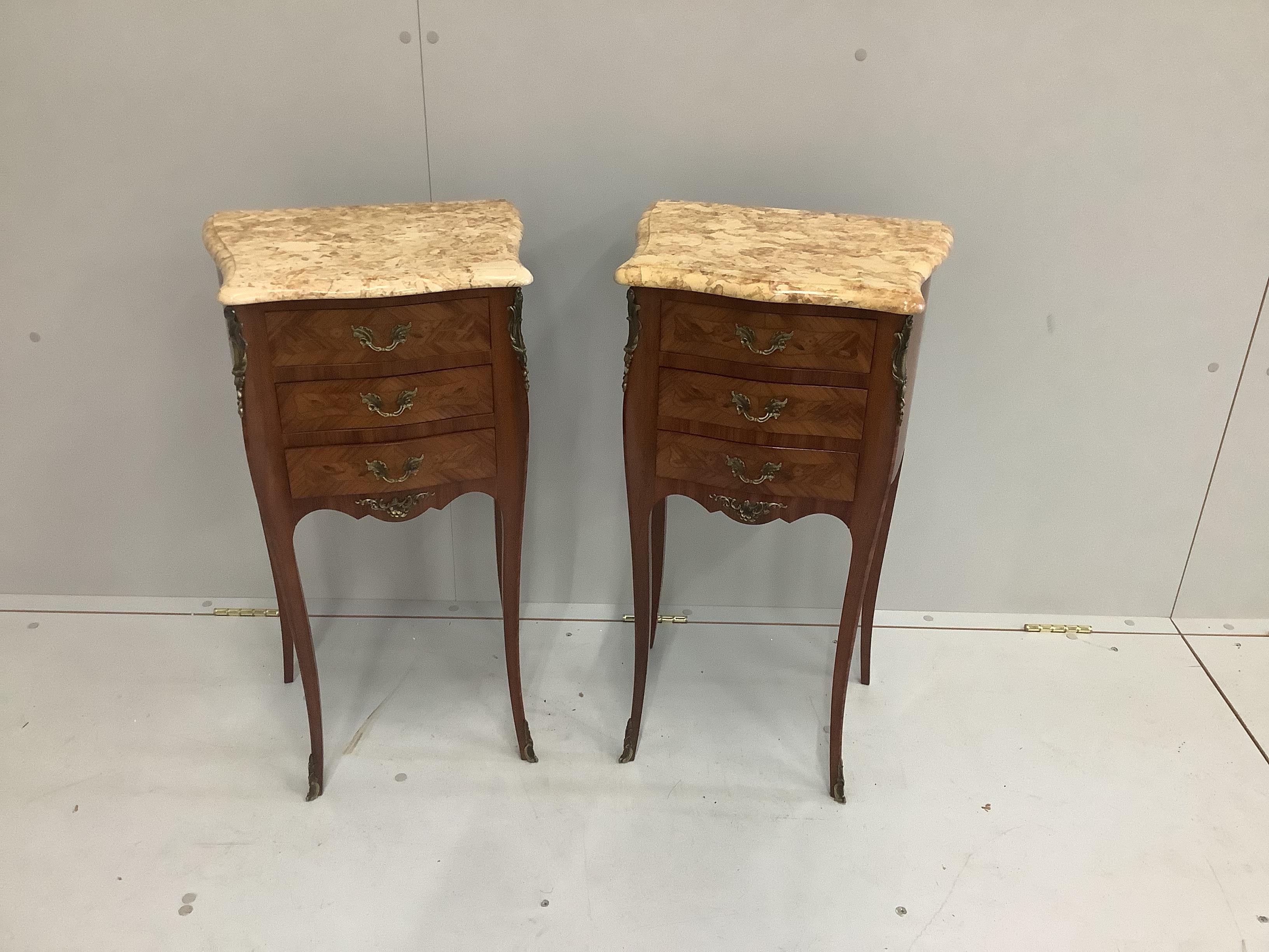 A pair of French marquetry inlaid marble topped three drawer bedside commodes, width 39cm, height 74cm